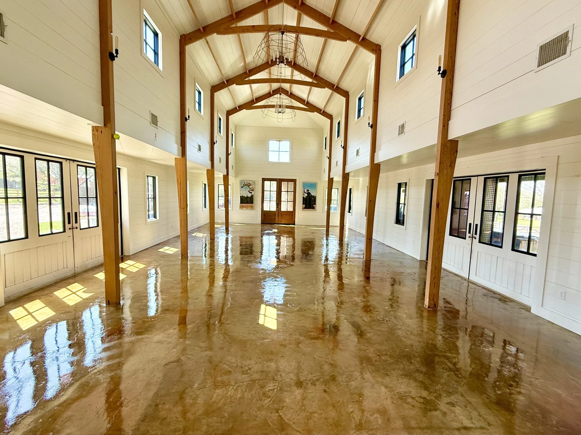 Stained concrete floor in a timber-framed great room