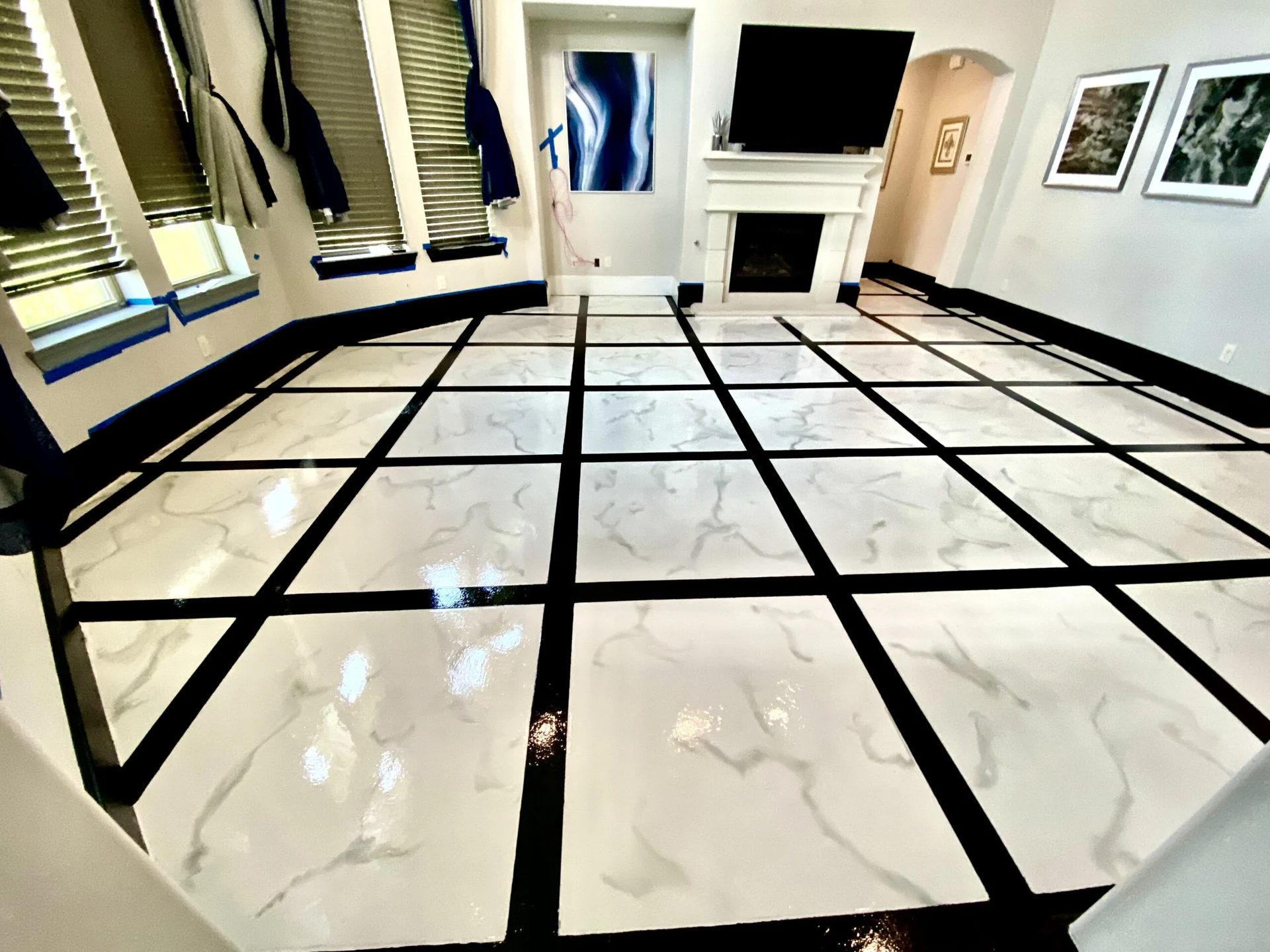 White epoxy floor with a black grid inlay