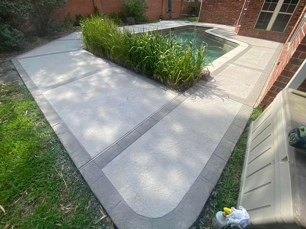 Decorative concrete path around a garden