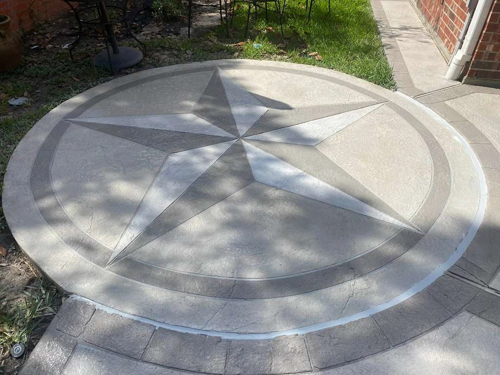 Compass medallion in a concrete patio