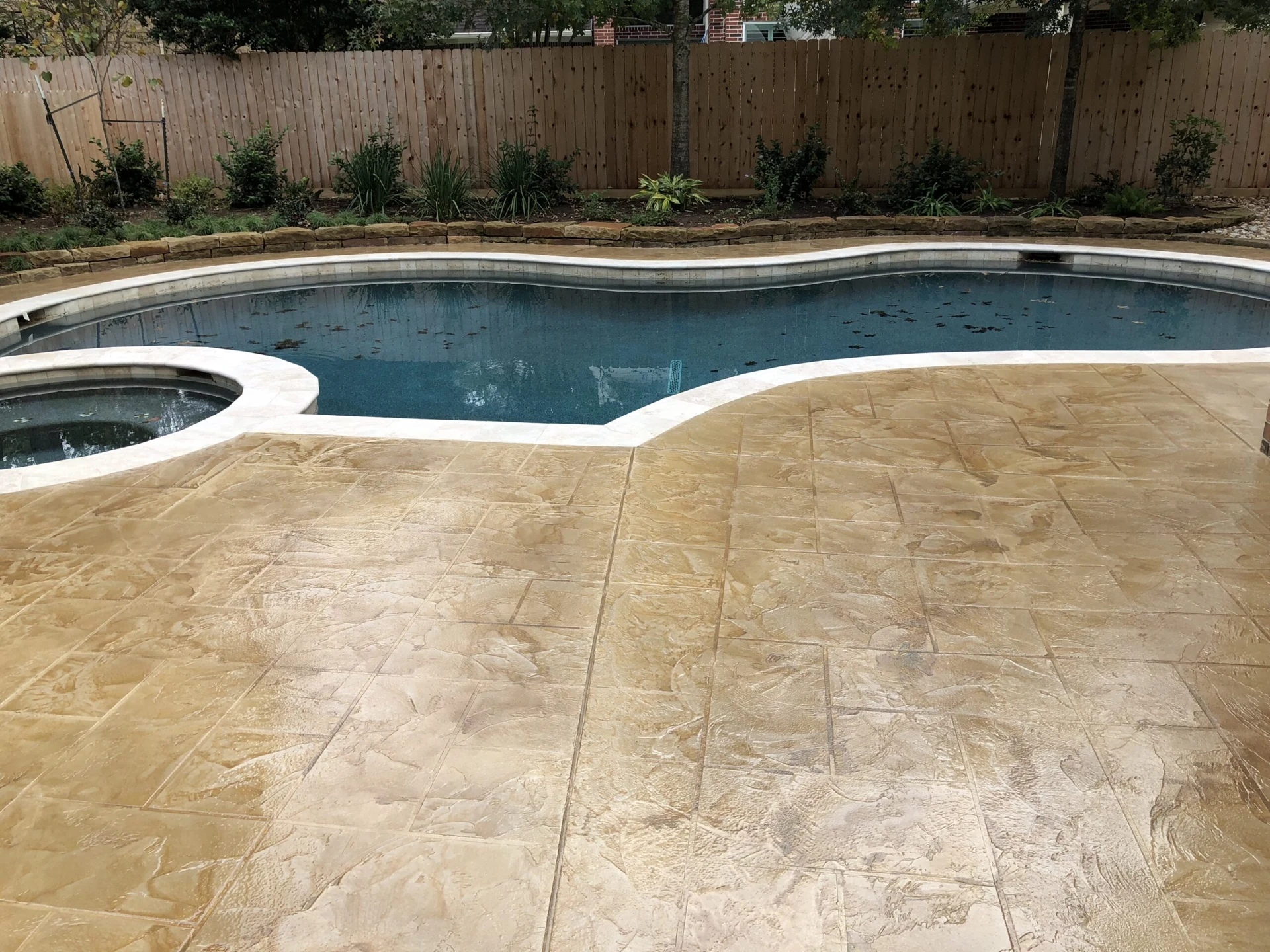 Stamped concrete pool deck and patio