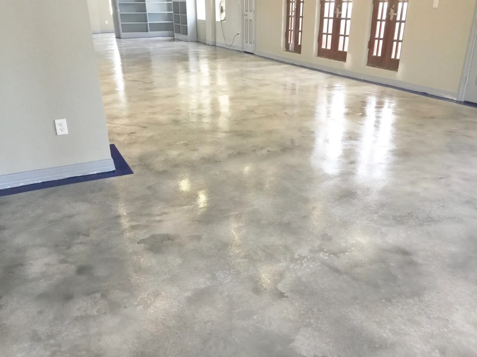 Polished concrete floor in a sunlit room