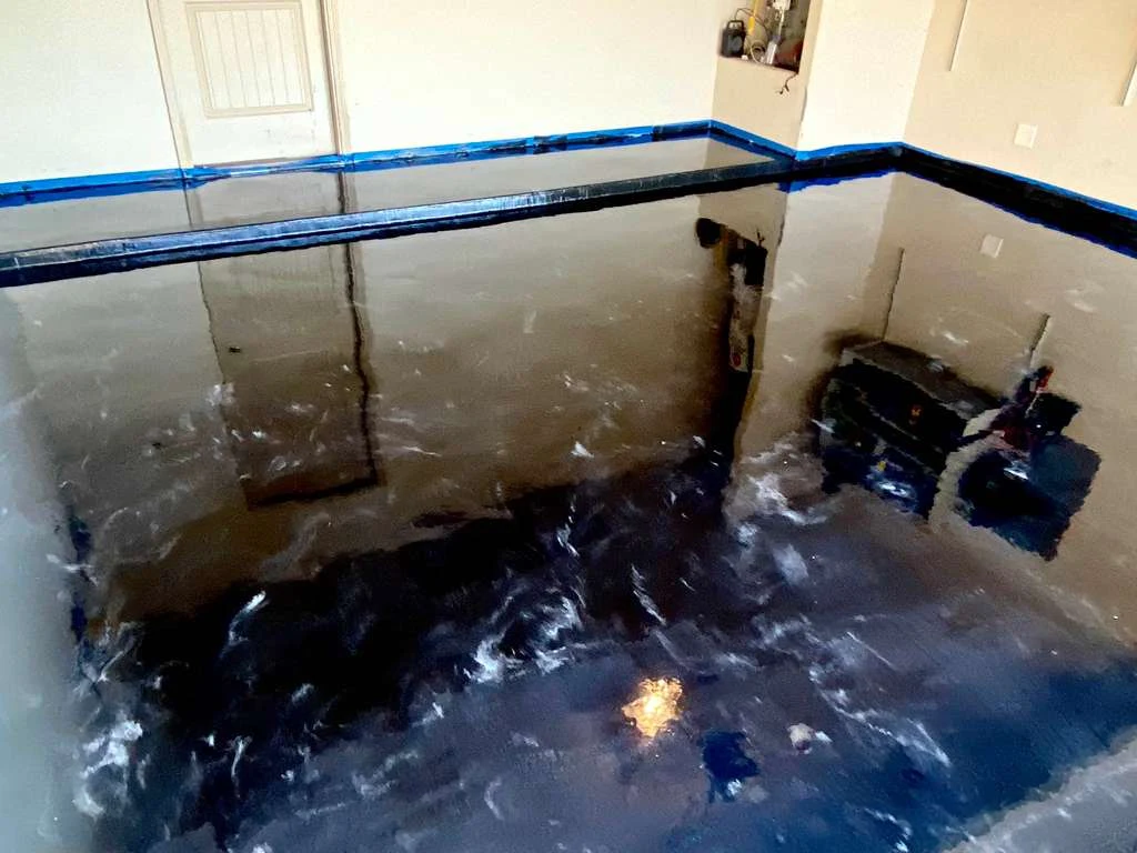 Blue metallic epoxy garage floor