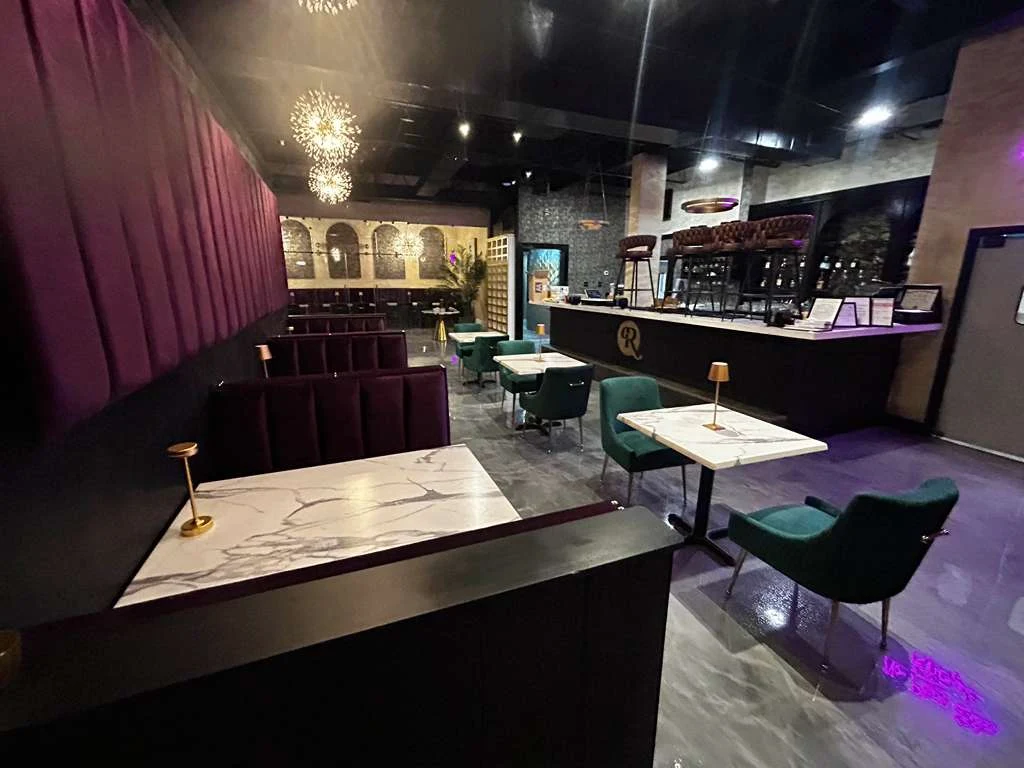 Dark decorative concrete finish in a dining venue