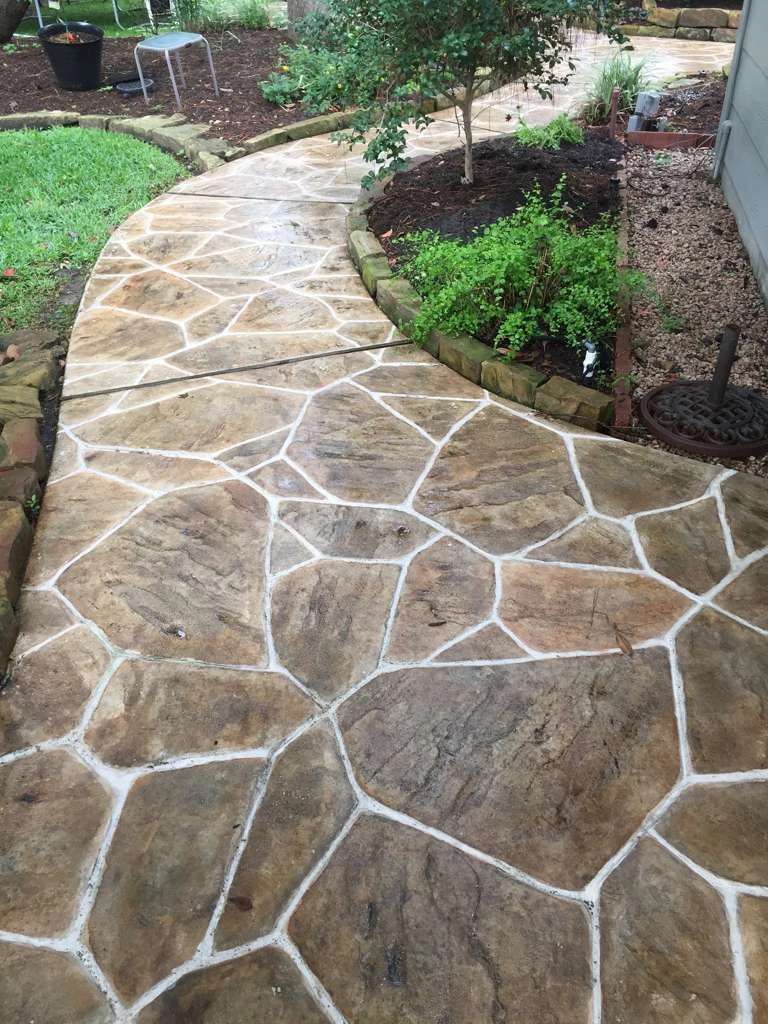 Stone-pattern concrete garden walkway